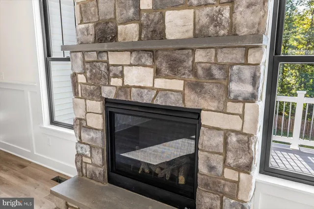 a view of a balcony with wooden floor