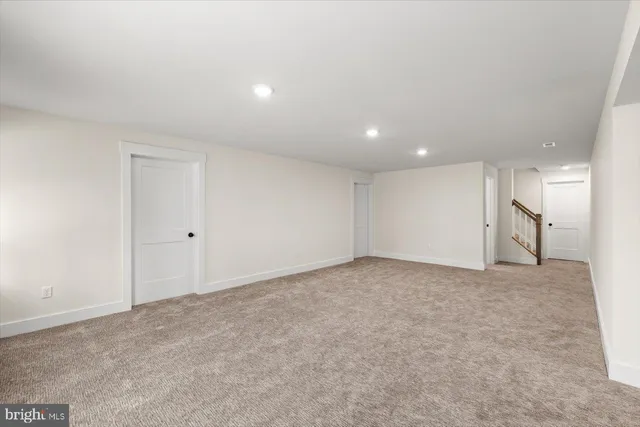 a view of a swimming pool with an outdoor space and seating area