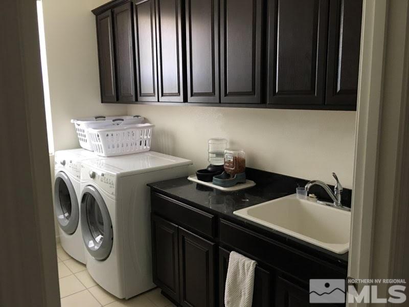2233 Alivia Way Reno, NV 89521 - Photo 7 of 10 a utility room with sink dryer and washer