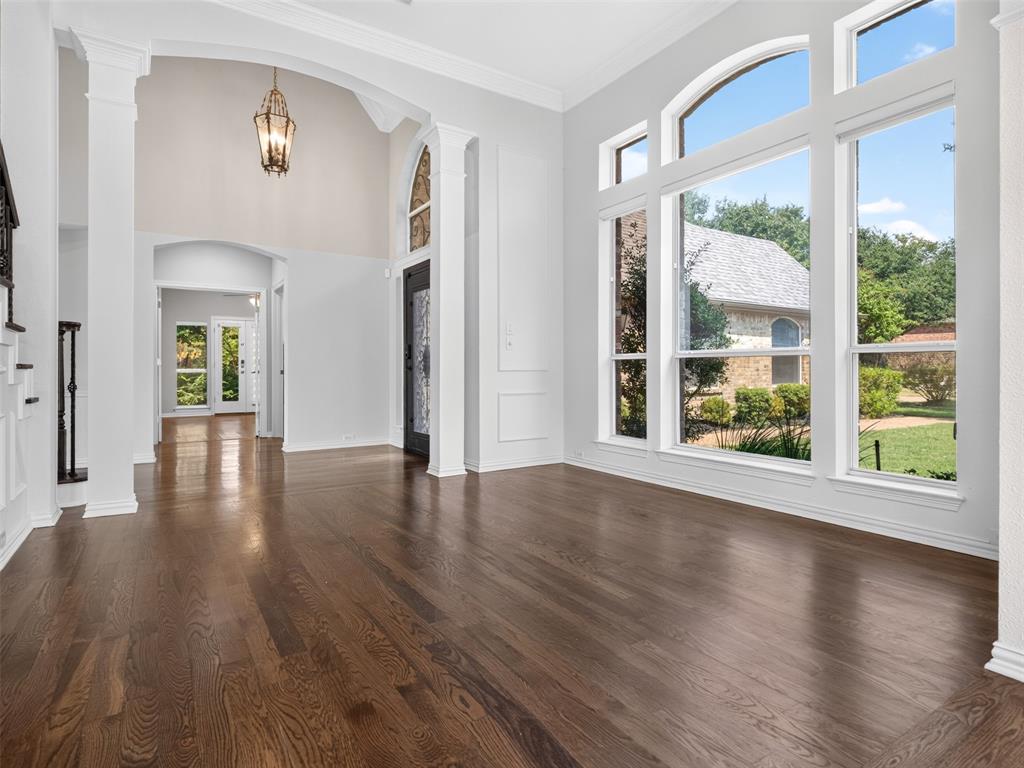 6809 Cedar Ridge Court Plano, TX 75093 - Photo 9 of 38 Rich wood-finish flooring with a high-gloss finish