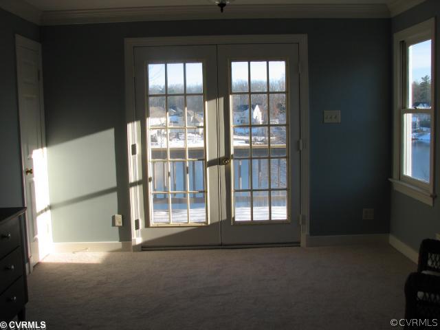 12011 Taplow Road Midlothian, VA 23112 - Photo 10 of 12 a view of an empty room with a window
