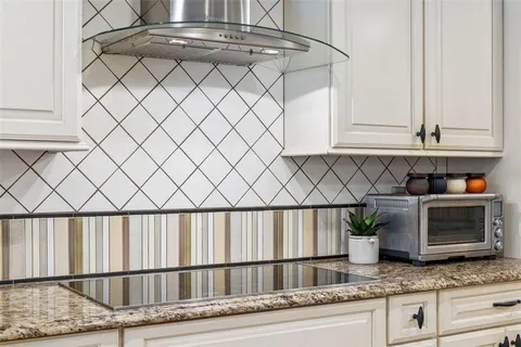 a bedroom with furniture and a wooden floor