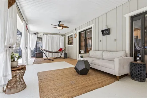 a view of swimming pool with a outdoor seating