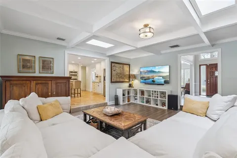 a living room with furniture and a table