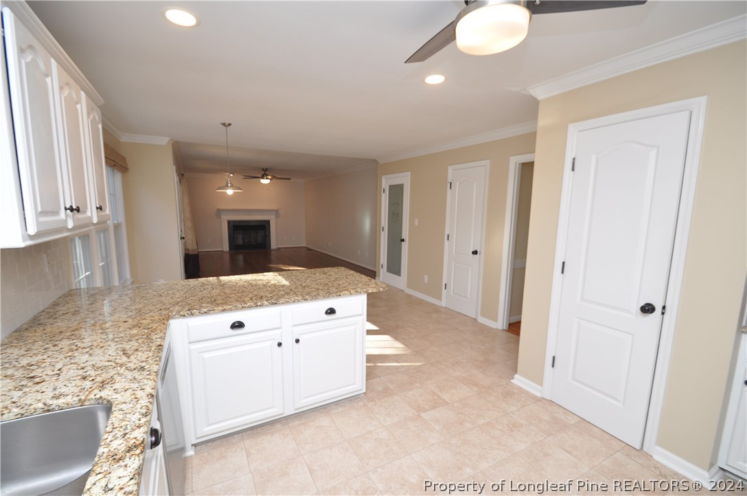 Undisclosed Address Cary, NC 27513 - Photo 24 of 50 a kitchen with stainless steel appliances granite countertop a stove a sink and a refrigerator