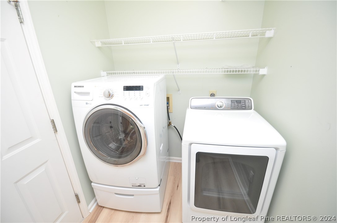 Undisclosed Address Cary, NC 27513 - Photo 32 of 50 a utility room with dryer and washer