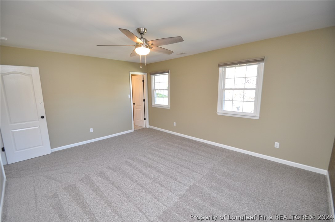Undisclosed Address Cary, NC 27513 - Photo 34 of 50 a view of an empty room with a window