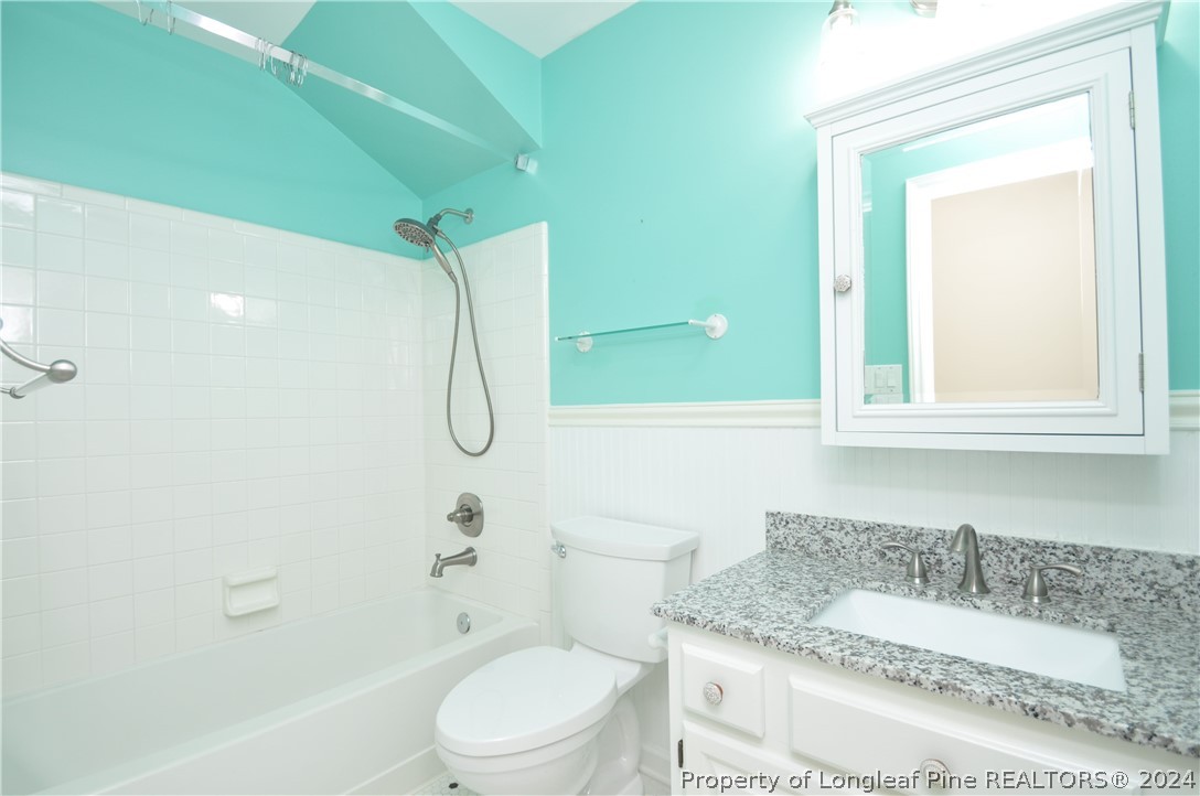 Undisclosed Address Cary, NC 27513 - Photo 46 of 50 a bathroom with a granite countertop toilet sink and shower