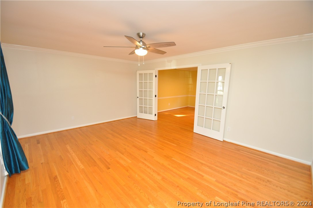 Undisclosed Address Cary, NC 27513 - Photo 8 of 50 an empty room with a empty space and fan