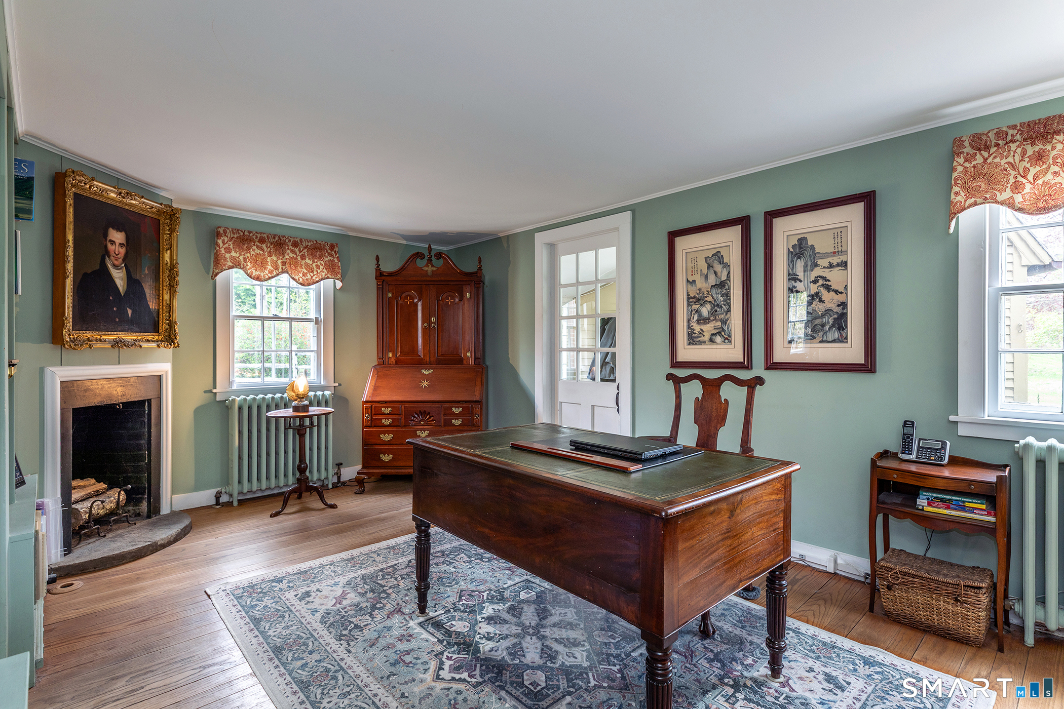30 Hollow Road Woodbury, CT 06798 - Photo 13 of 40 a living room with furniture fireplace and window