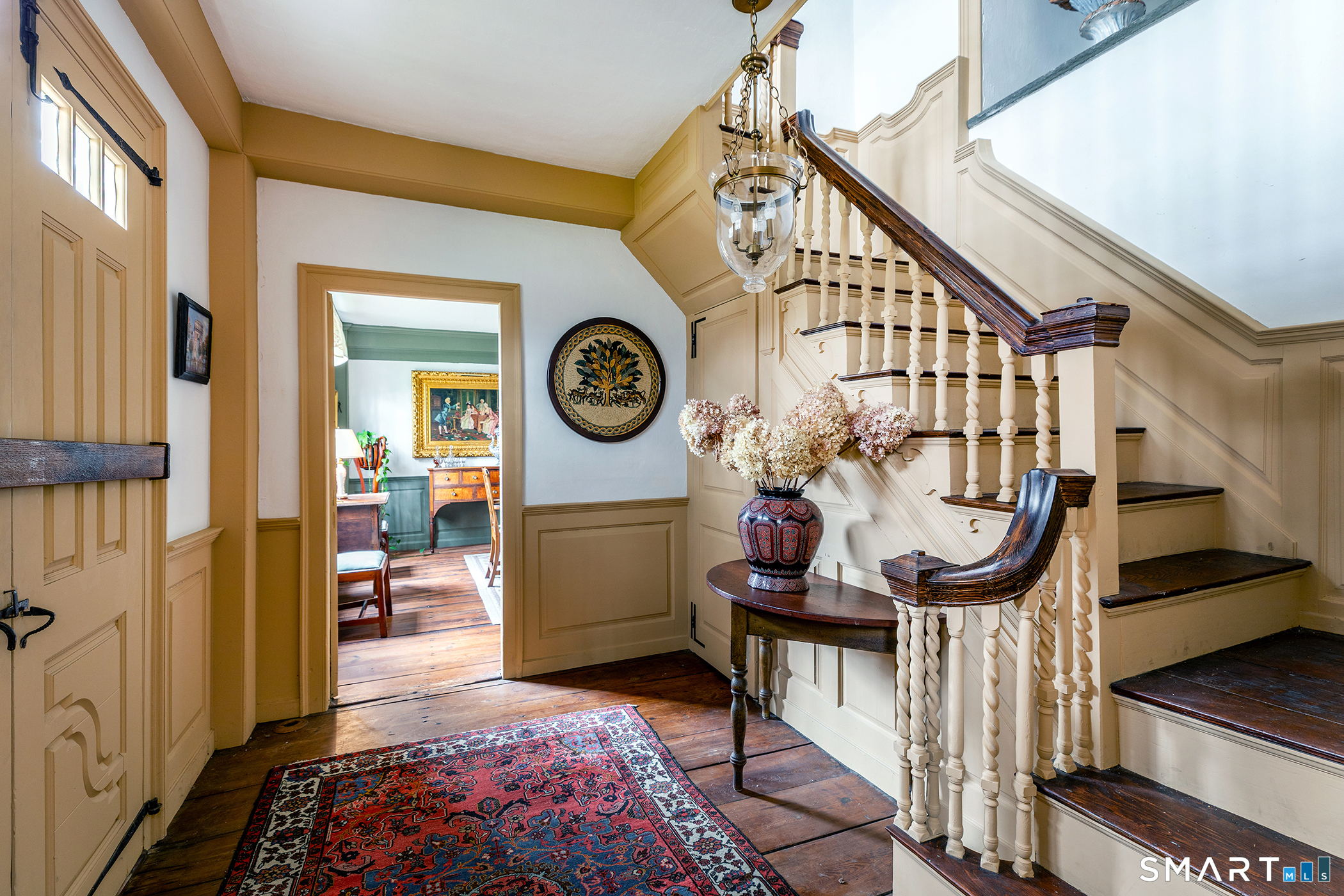 30 Hollow Road Woodbury, CT 06798 - Photo 17 of 40 a view of a hallway with entryway wooden floor and front door