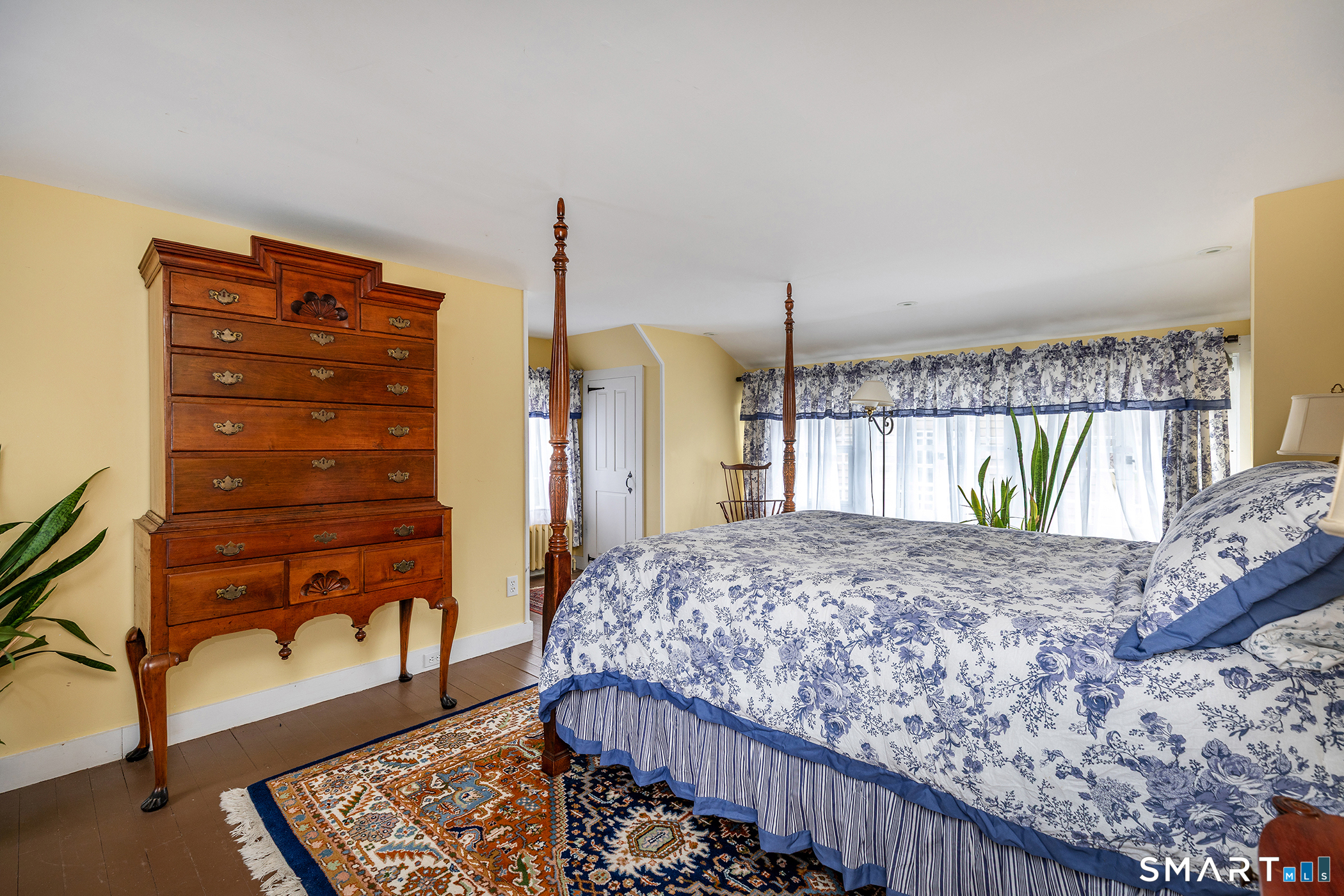 30 Hollow Road Woodbury, CT 06798 - Photo 25 of 40 a bed sitting in a bedroom next to a window