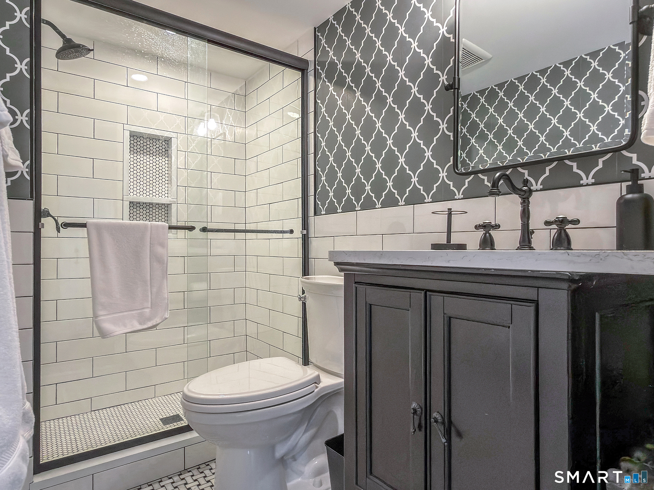 30 Hollow Road Woodbury, CT 06798 - Photo 28 of 40 a bathroom with a sink toilet and shower