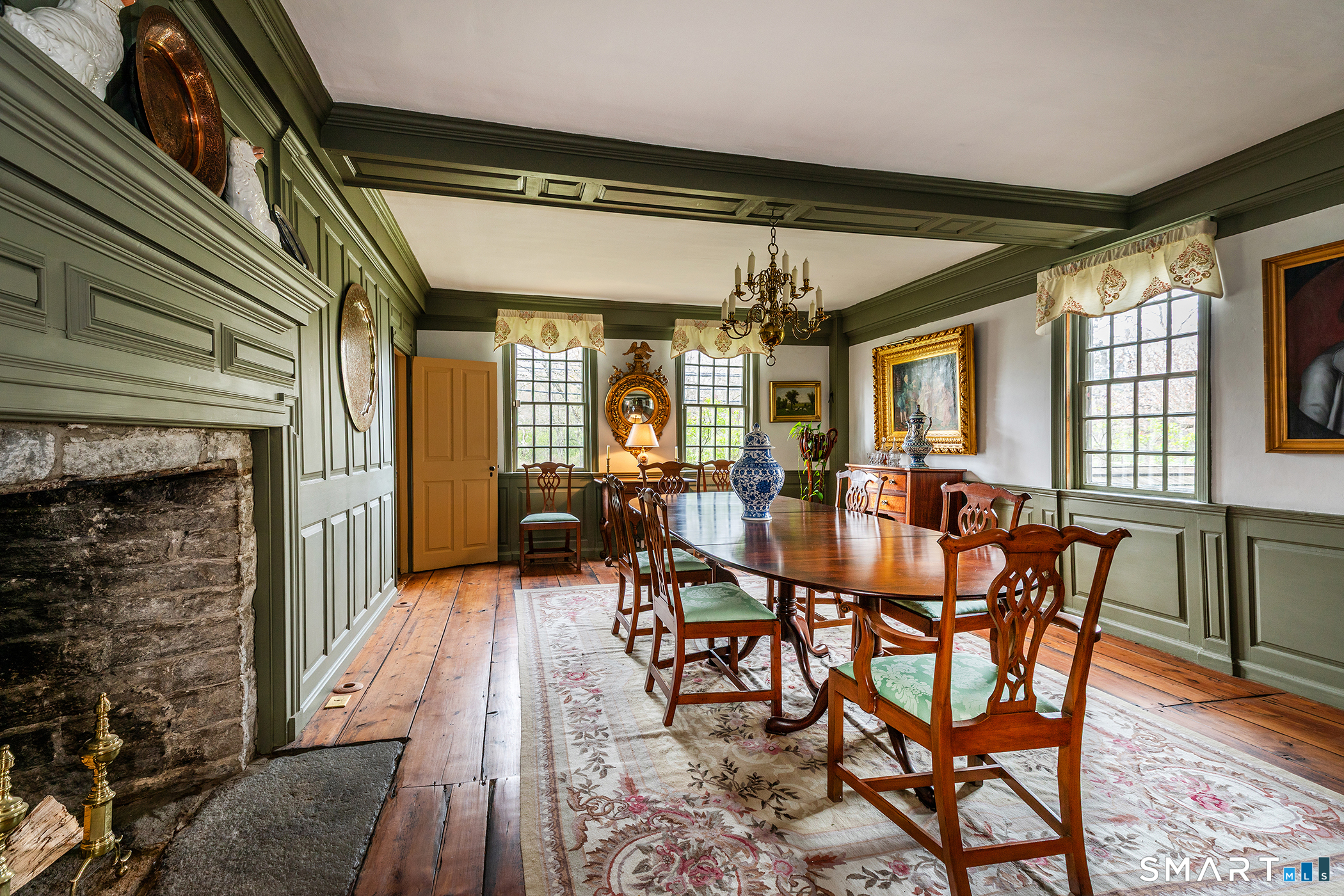 30 Hollow Road Woodbury, CT 06798 - Photo 3 of 40 a view of a dining room with furniture and wooden floor