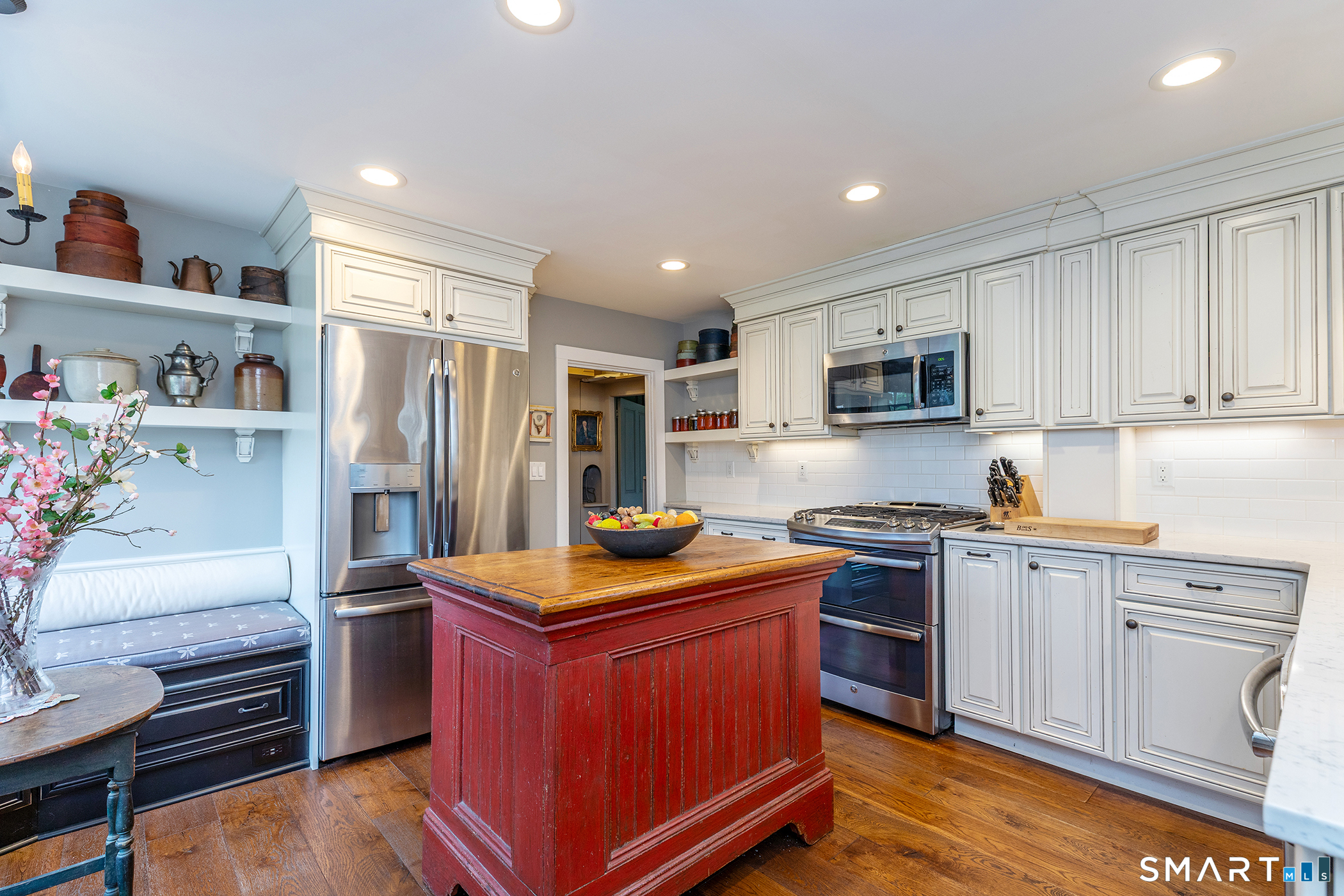 30 Hollow Road Woodbury, CT 06798 - Photo 9 of 40 a kitchen with stainless steel appliances granite countertop a refrigerator stove and sink