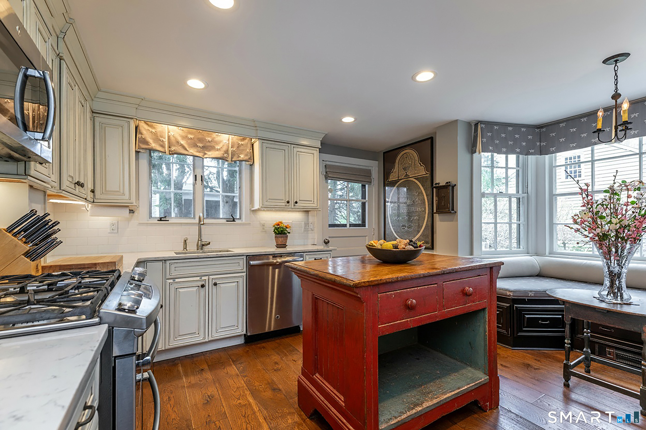 30 Hollow Road Woodbury, CT 06798 - Photo 10 of 40 a kitchen with granite countertop a sink stove and cabinets