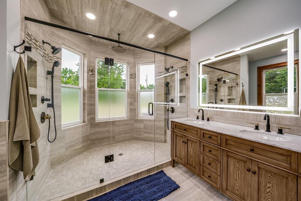 1037 Harrison Road Denison, TX 75021 - Photo 21 of 39 Main Spacious bathroom featuring a dual-sink vanity with wood cabinetry and stone countertops