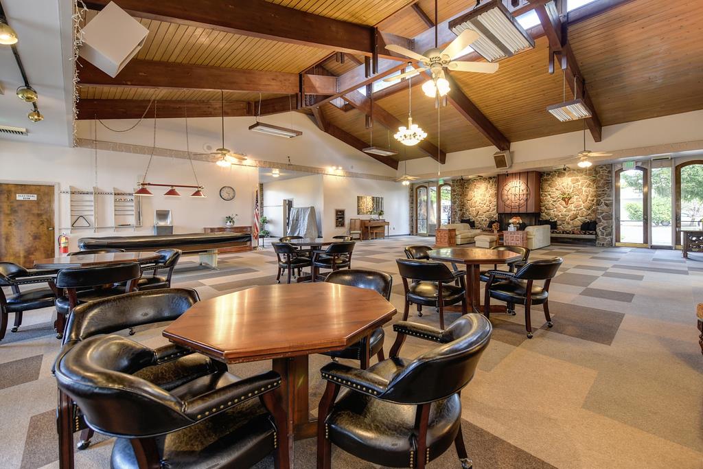 14789 Jurata Court Rancho Murieta, CA 95683 - Photo 20 of 36 a kitchen with a dining table and chairs