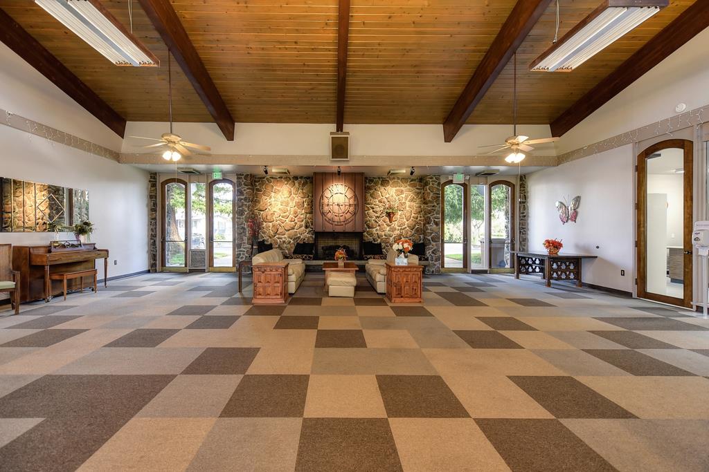 14789 Jurata Court Rancho Murieta, CA 95683 - Photo 22 of 36 a view of a lobby with furniture and a potted plant