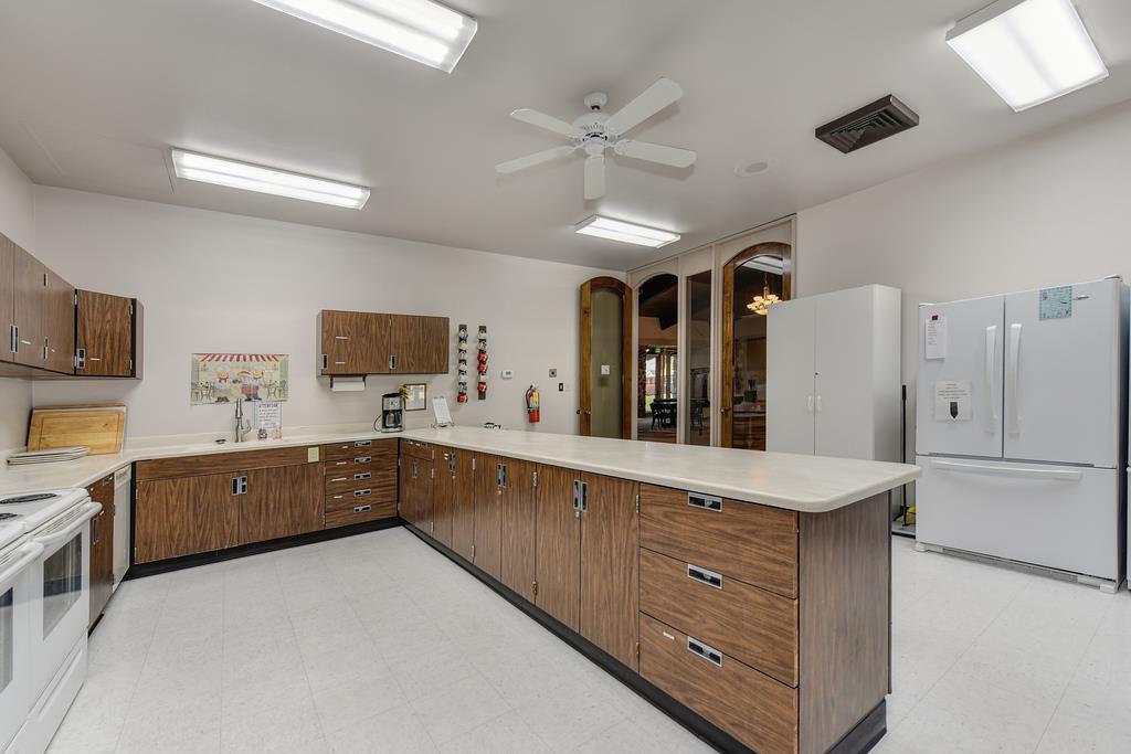 14789 Jurata Court Rancho Murieta, CA 95683 - Photo 27 of 36 a large kitchen with cabinets