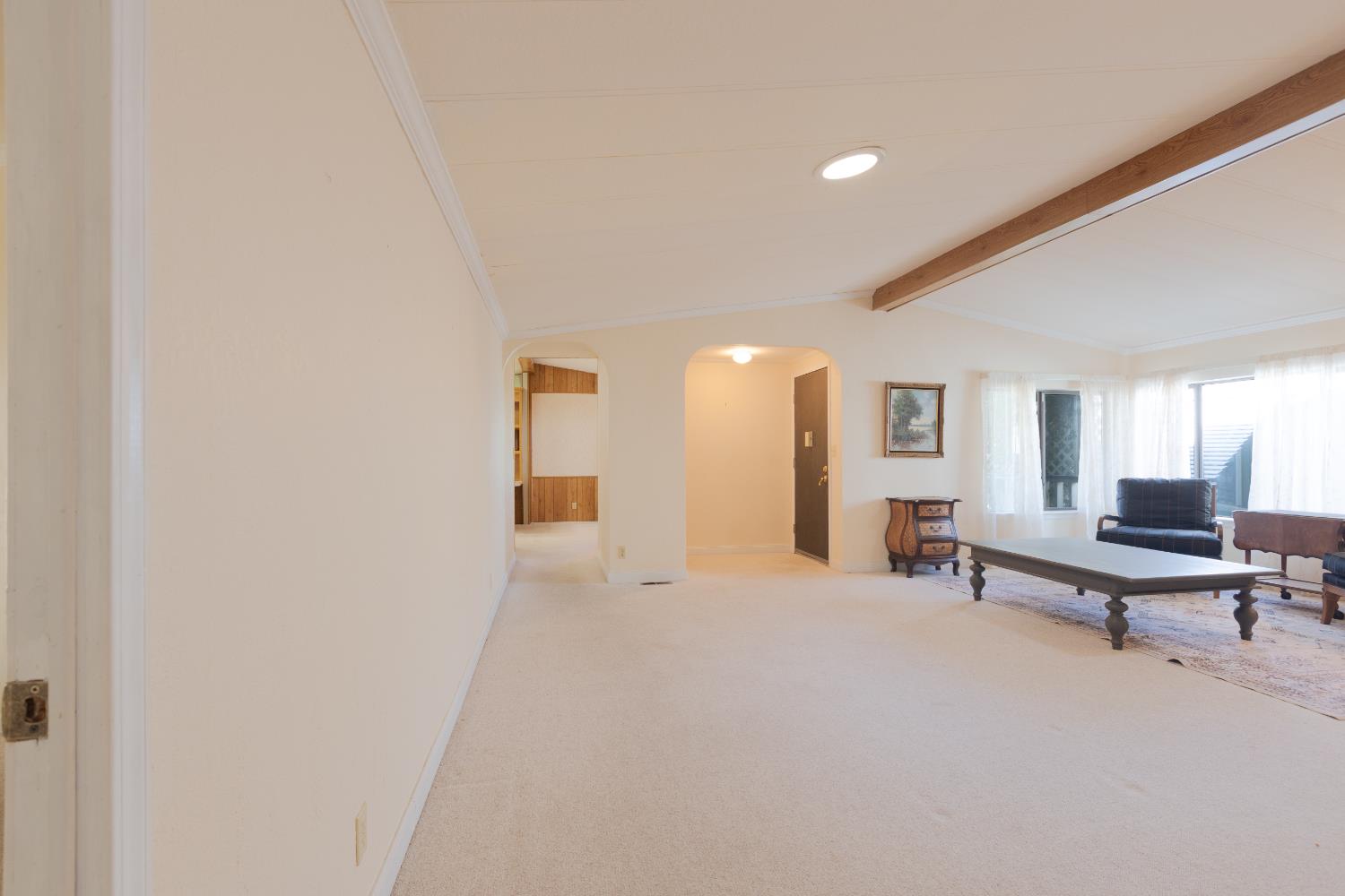 14789 Jurata Court Rancho Murieta, CA 95683 - Photo 4 of 36 a view of a livingroom with furniture and windows