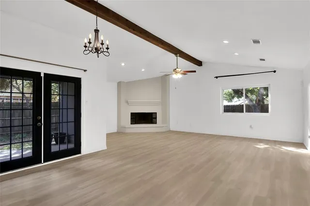 en view of an empty room with a window