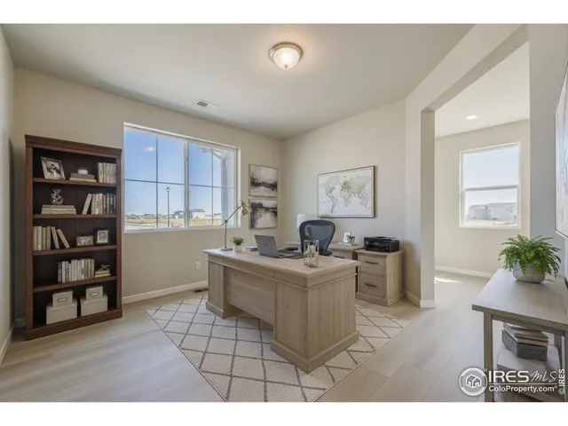 a living room with furniture and decor