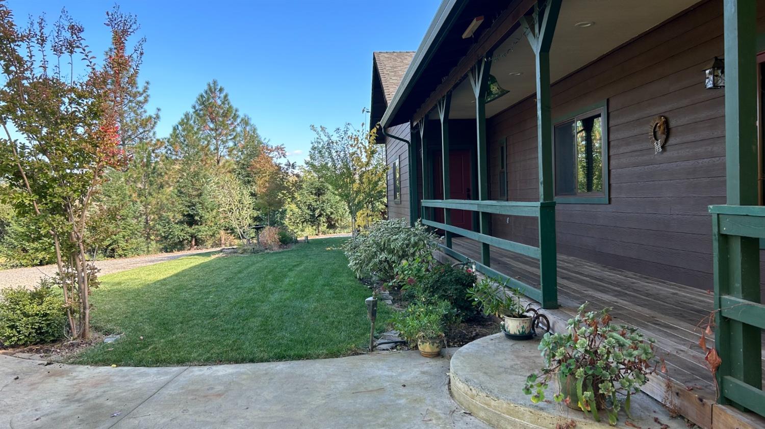 9080 El Dorado Trail Mountain Ranch, CA 95246 - Photo 7 of 48 a view of a house with a yard
