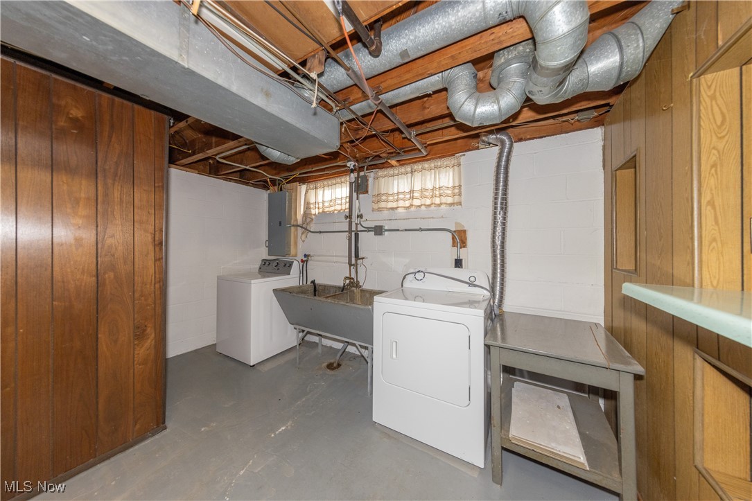 29103 Barjode Road Eastlake, OH 44095 - Photo 26 of 31 Laundry area with concrete floors, washing machine and clothes dryer, and electric panel