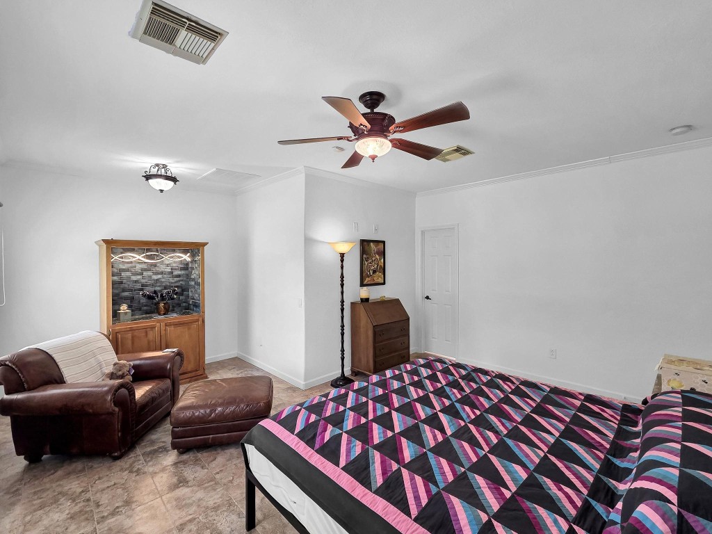 1771 Wilpitz Road Brookshire, TX 77423 - Photo 22 of 50 a bedroom with a bed and a couch