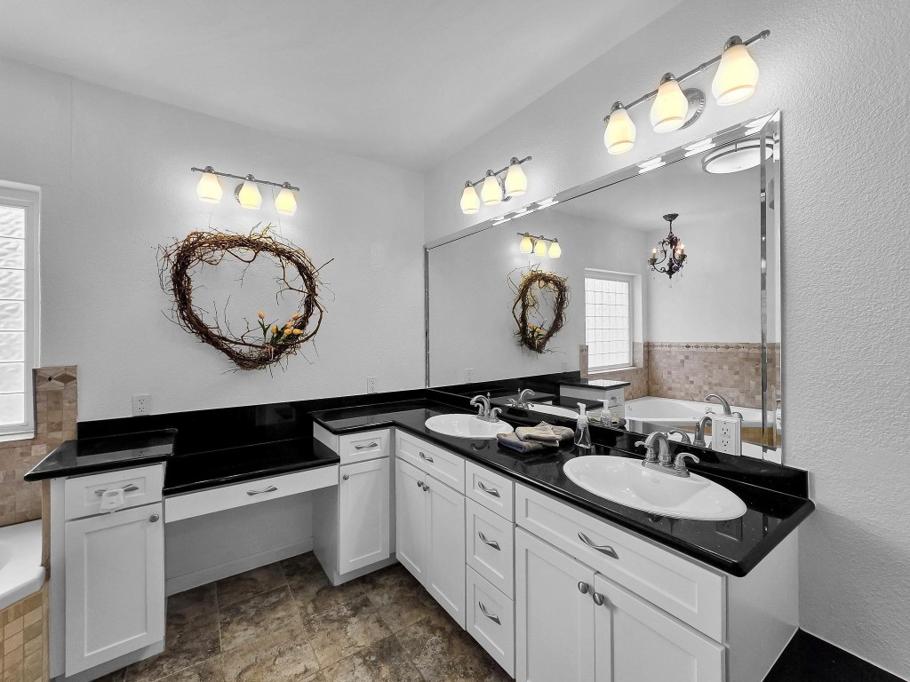 1771 Wilpitz Road Brookshire, TX 77423 - Photo 25 of 50 a bathroom with a sink and a mirror