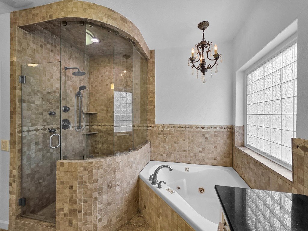 1771 Wilpitz Road Brookshire, TX 77423 - Photo 26 of 50 a bathroom with a bathtub a sink and a shower