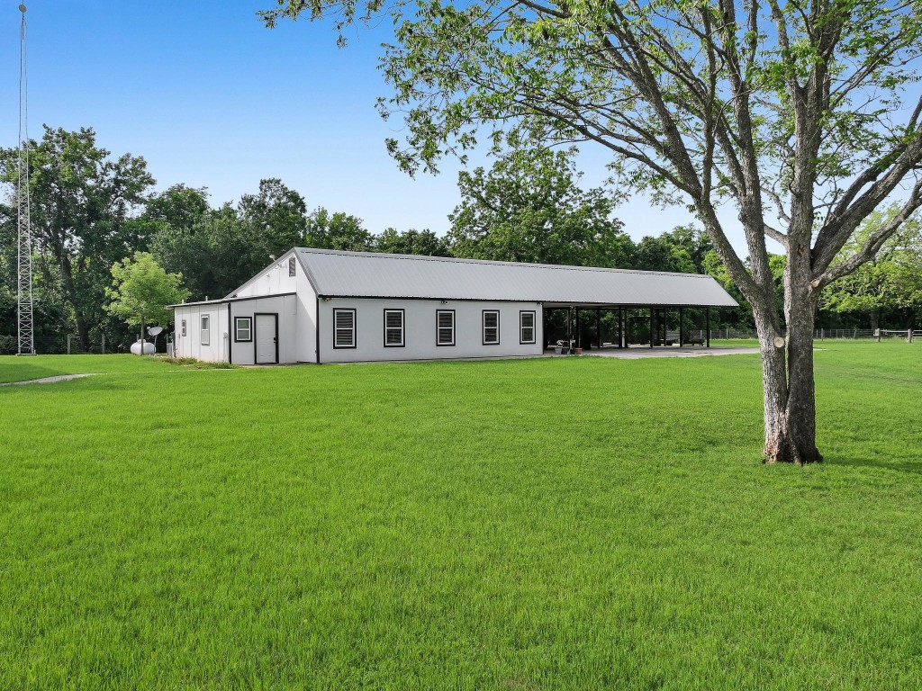 1771 Wilpitz Road Brookshire, TX 77423 - Photo 5 of 50 a view of a house with a big yard