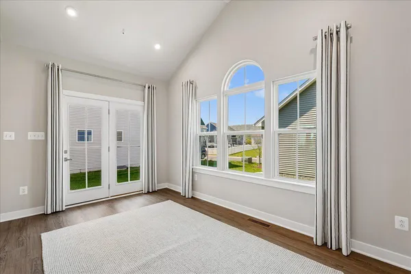 an empty room with windows