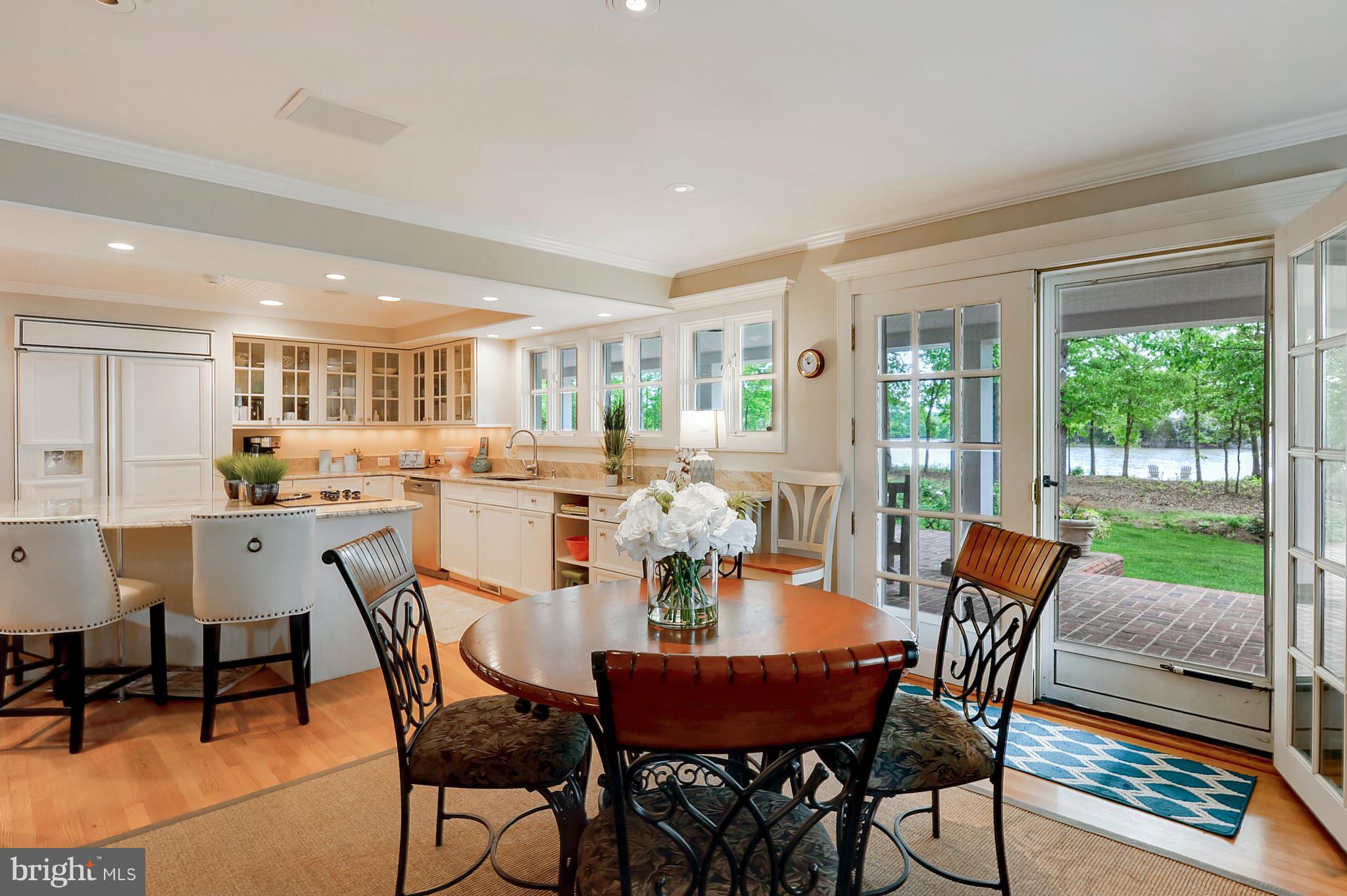 700 Seagull Beach Road Prince Frederick, MD 20678 - Photo 18 of 30 a view of a dining room with furniture window and outside view