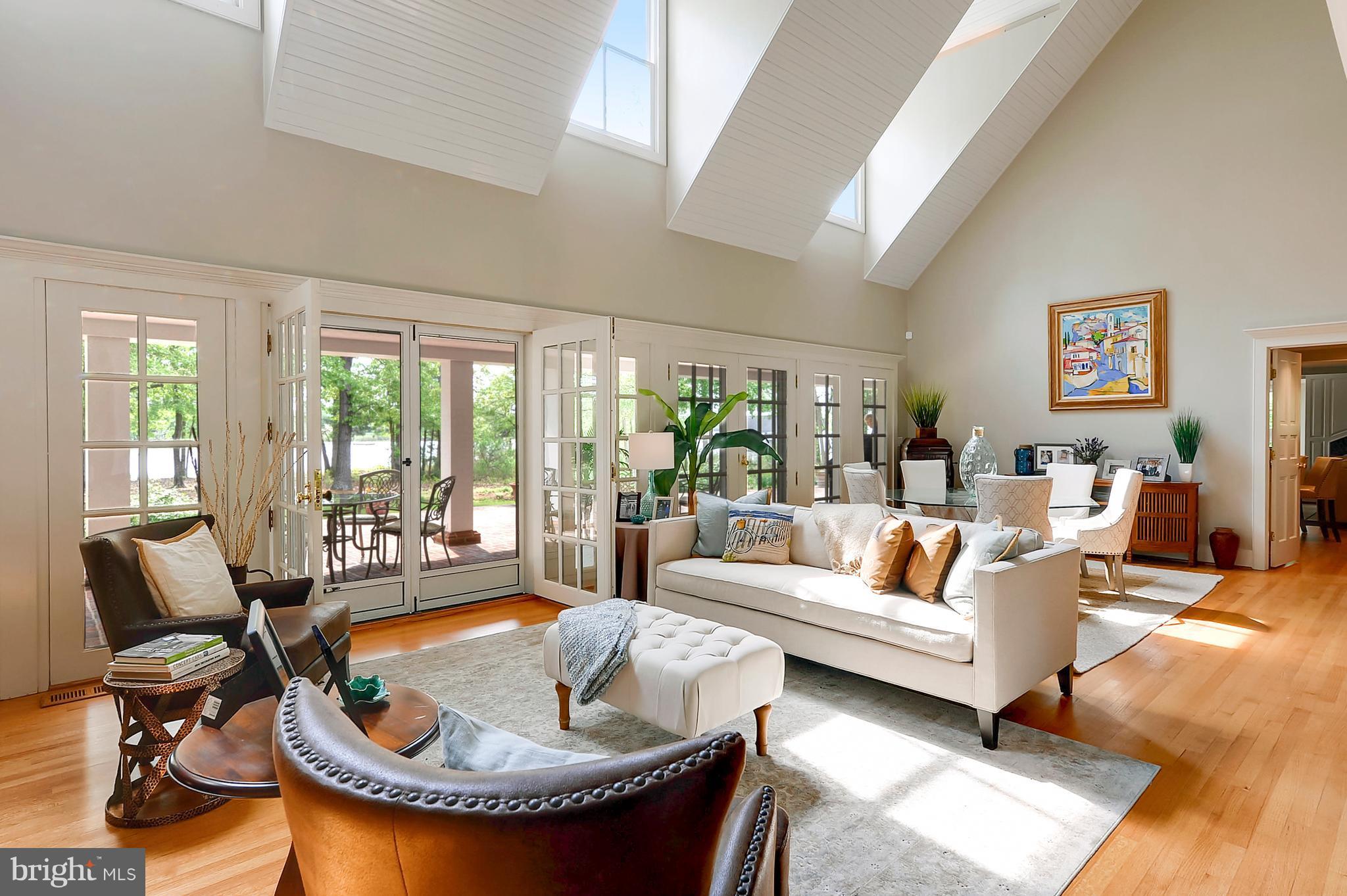 700 Seagull Beach Road Prince Frederick, MD 20678 - Photo 3 of 30 a living room with furniture and a large window