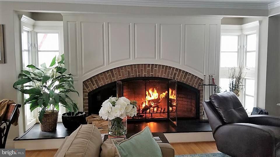 700 Seagull Beach Road Prince Frederick, MD 20678 - Photo 8 of 30 a living room with furniture and a fireplace