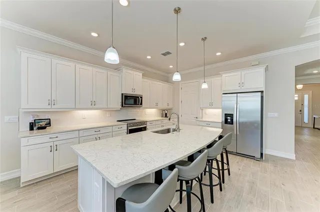 a bedroom with two beds and a window