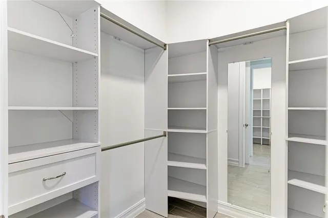 a living room with furniture a patio and a table