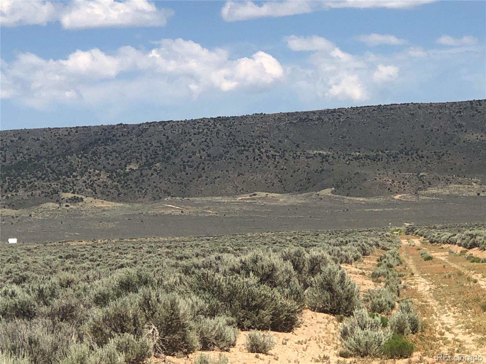 0 County Rd J San Luis, CO 81152 - Photo 6 of 8 a view of a lake view