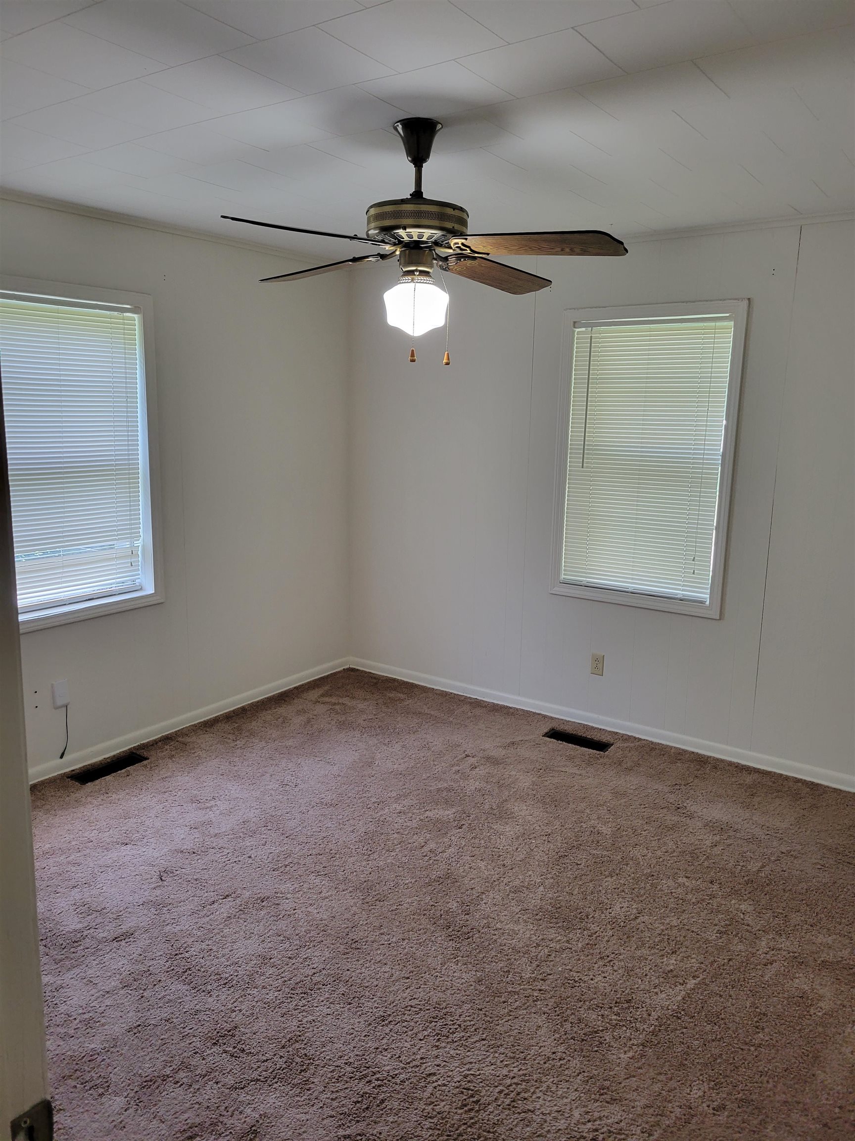 1572 Asbury Glimp Road Ripley, TN 38063 - Photo 14 of 20 a view of an empty room with a window