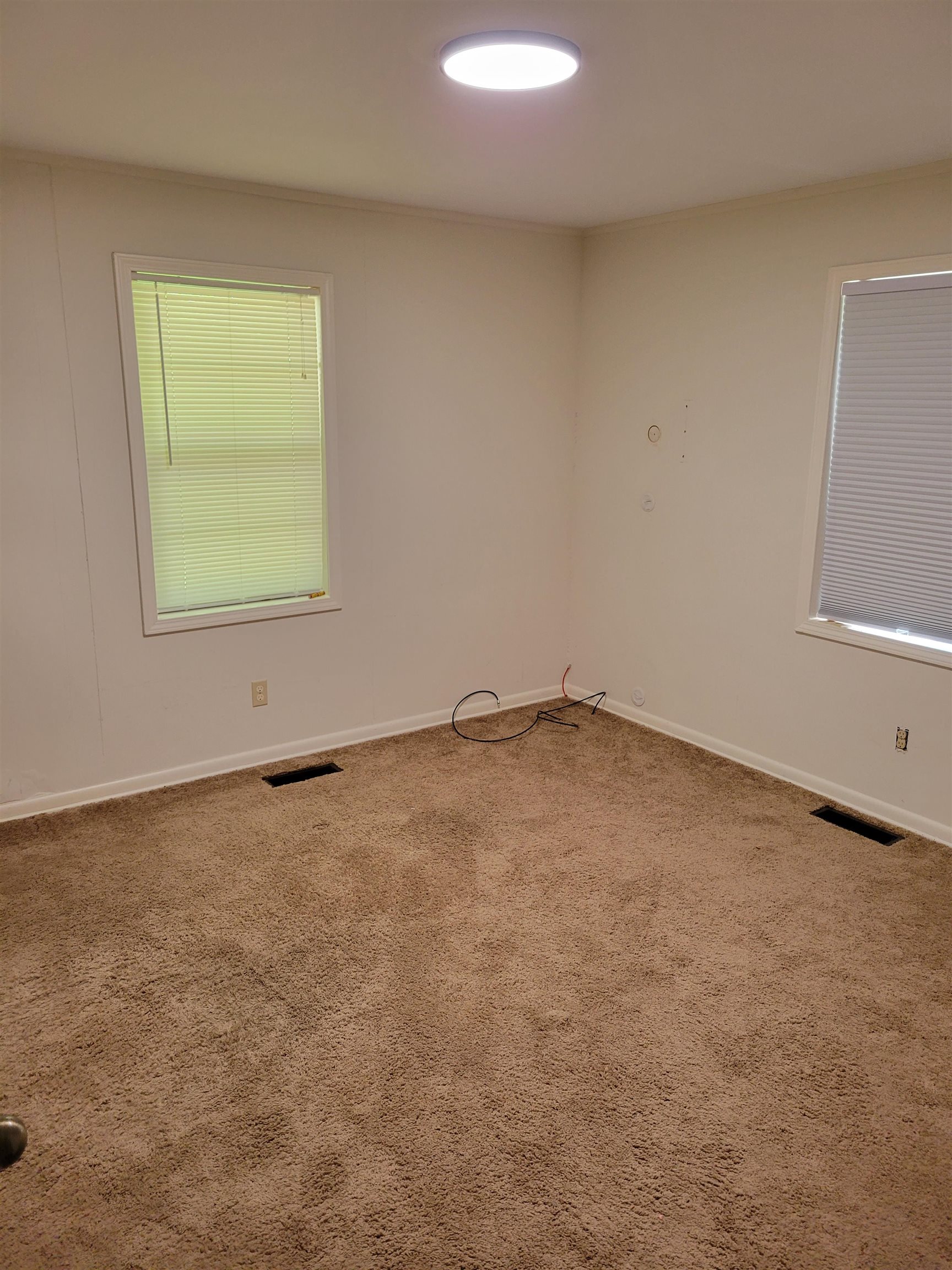 1572 Asbury Glimp Road Ripley, TN 38063 - Photo 19 of 20 an empty room with a window