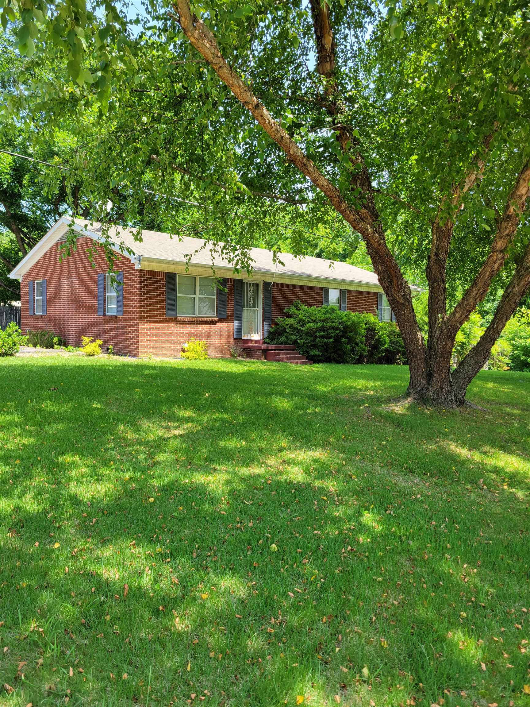 1572 Asbury Glimp Road Ripley, TN 38063 - Photo 3 of 20 a front view of house with yard and green space