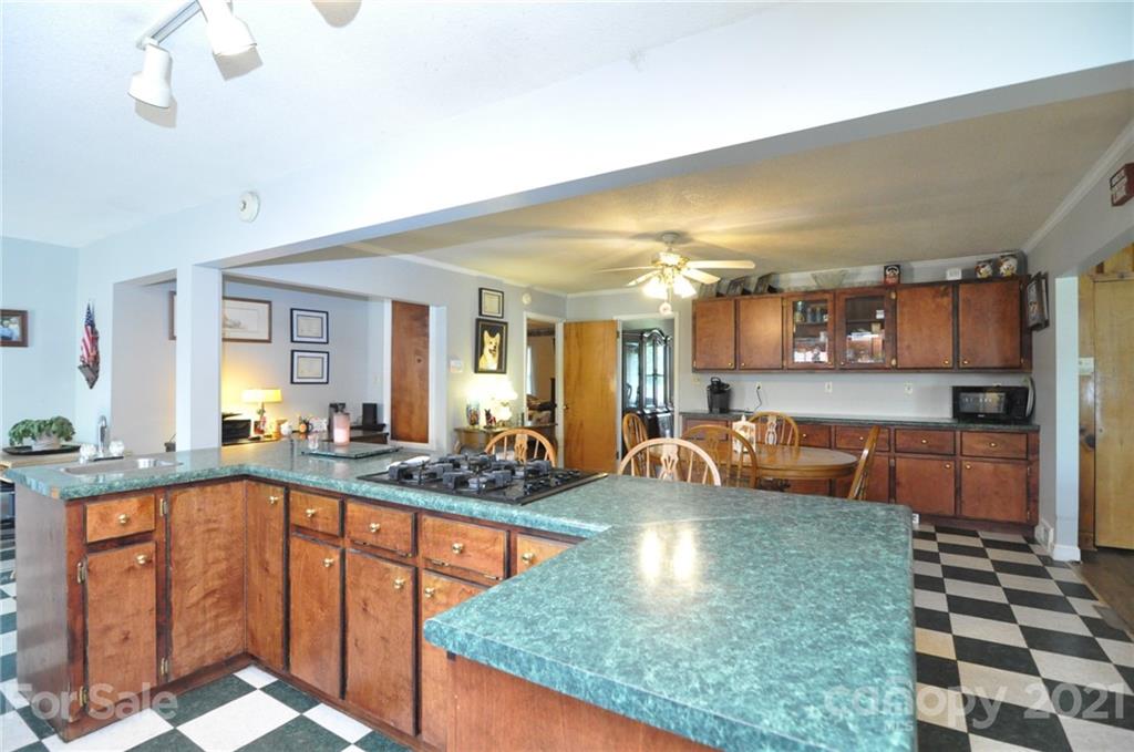 501 Redland Road Landrum, SC 29356 - Photo 15 of 38 a large kitchen with lots of counter space and sink