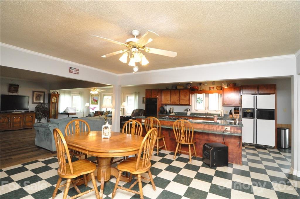 501 Redland Road Landrum, SC 29356 - Photo 18 of 38 a view of a dining room with furniture