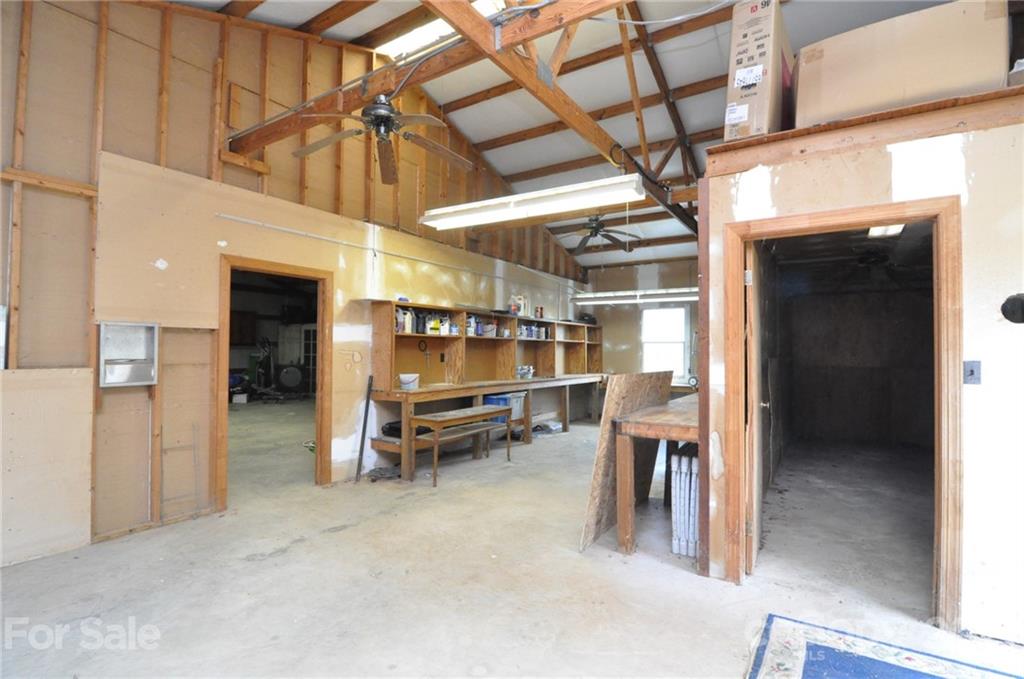 501 Redland Road Landrum, SC 29356 - Photo 33 of 38 a view of an empty room with a fireplace
