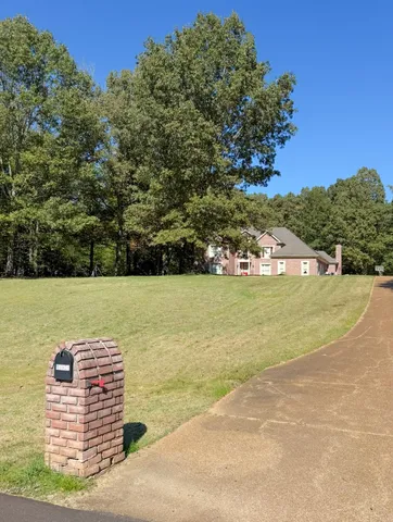 a view of a water with a building in the background