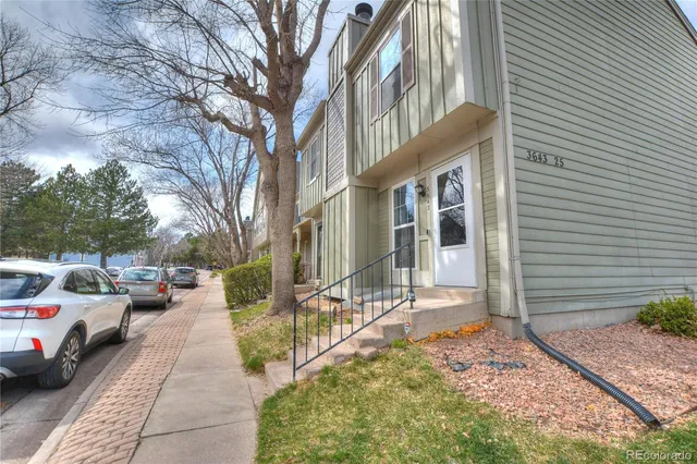 a view of a building with a bench