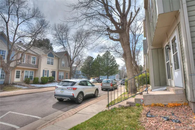a view of a street with cars