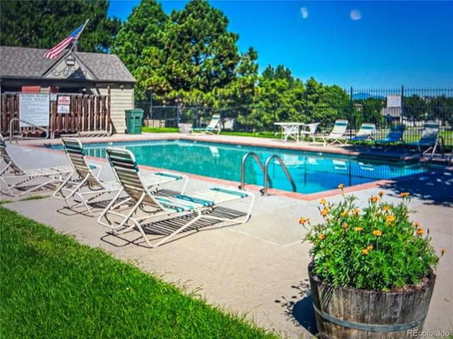 a view of a swimming pool with a patio